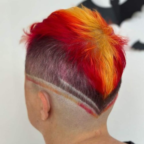 Red and Orange Hair Color With Mohawk Haircut in Springfield, MO - Blu Skies Salon
